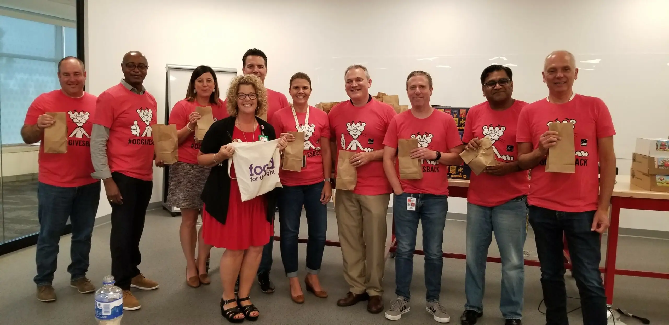 Volunteers serving Food For Thought neighbors