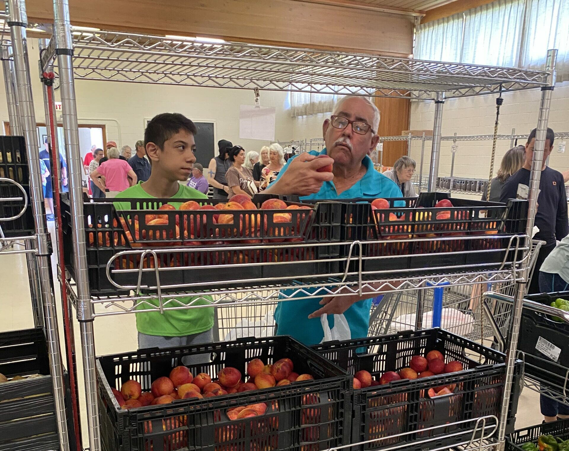 Neighbors visiting a Food For Thought pantry