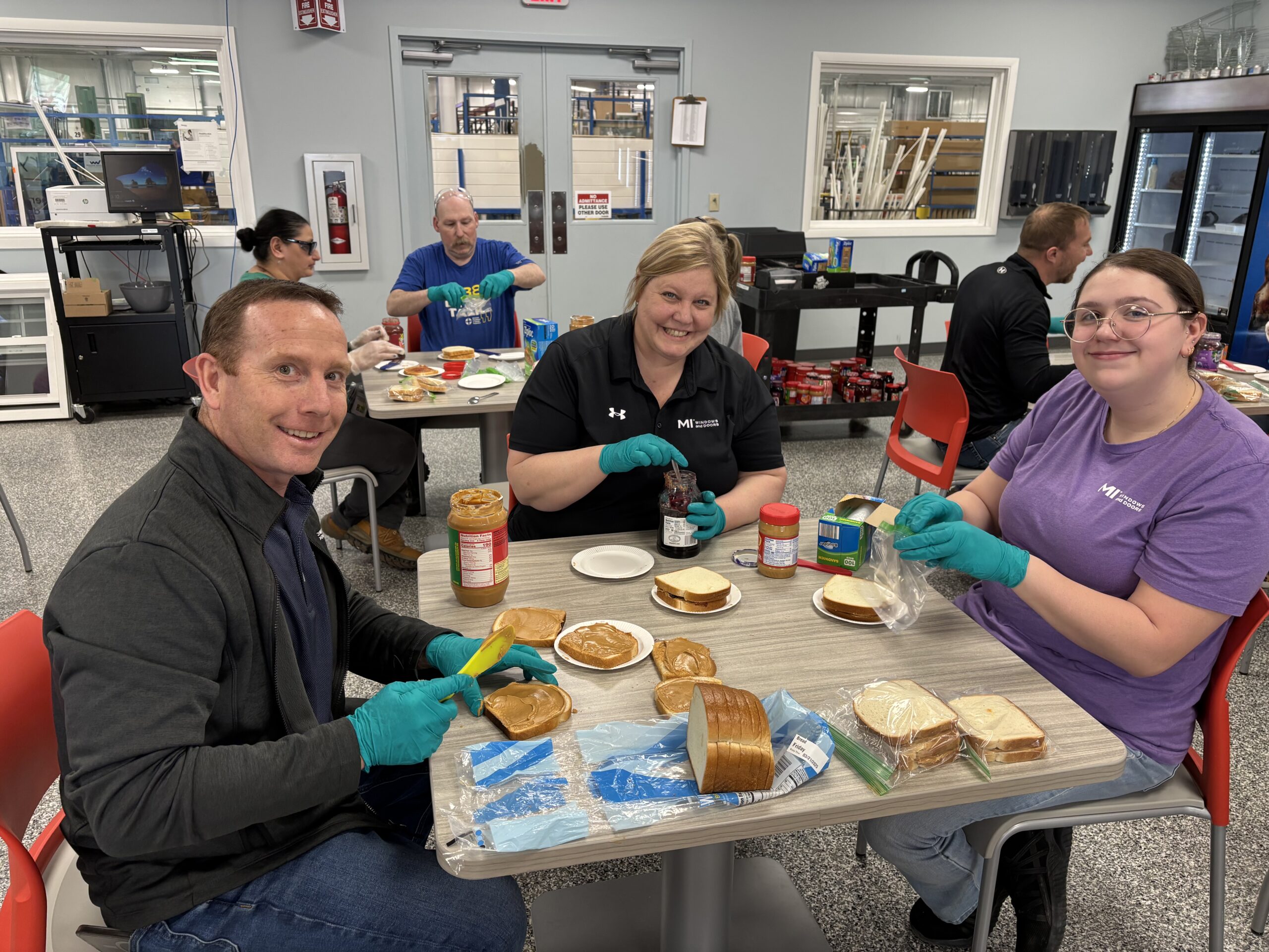 Volunteers packing PB and J lunches